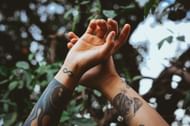 Infinity in itself carries a lot of weight and meaning. When combined with mental health, it becomes a very powerful tattoo. (Image via Unsplash/Matheus Ferrero)
